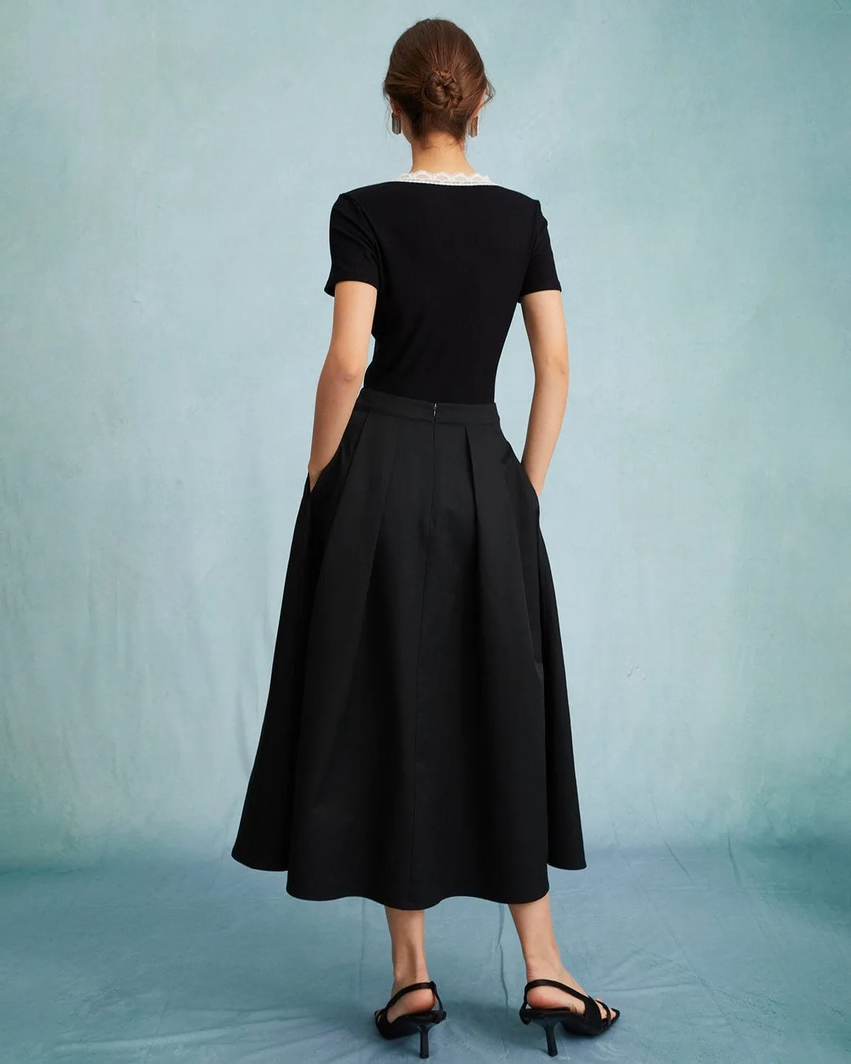 The Black High Waisted Pleated Midi Skirt