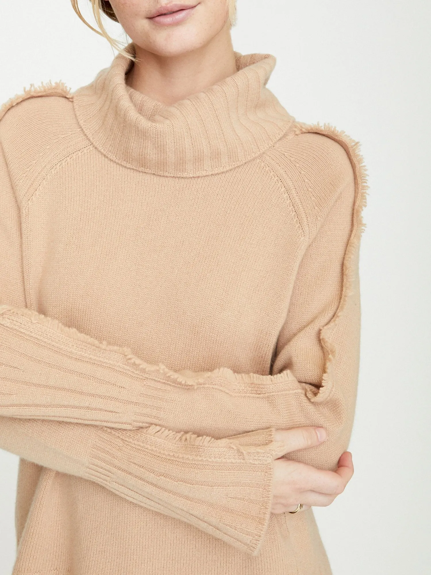 The Jolie Fringe Turtleneck